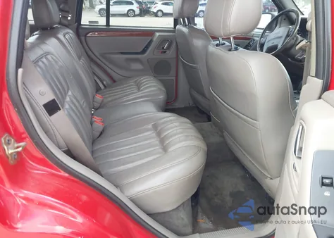 1999 Jeep Grand Cherokee Limited из США, поврежденный, VIN 1J4GW68N1XC745441